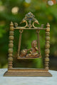 Brass Krishna on Swing